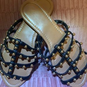 Black and gold sandals